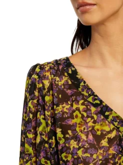 Blouse multicolore moucheté à coupe péplum col v et à manches longues