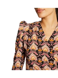 Blouse noire avec imprimé floral all-over coupe péplum col cache-coeur