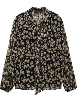 Blouse noire imprimée avec une coupe droite à col rond et des manches longues