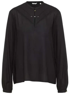 Blouse noire unie avec un col tunisien et des manches longues