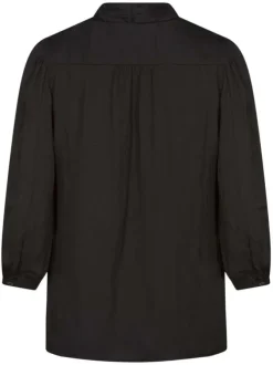 Blouse noire unie avec une coupe ample un col v et des manches 3/4