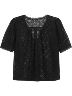 Blouse noire unie en dentelle avec une coupe droite et un col rond