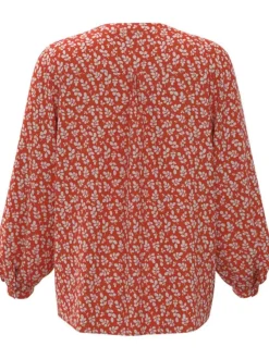 Blouse rouge coupe droite avec un col rond fendu et imprimé floral