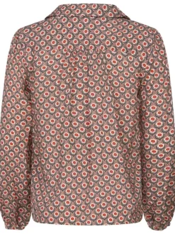 Blouse rouge fleurie à coupe droite col v et à manches longues