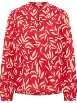 Blouse rouge ornée d'un motif fantaisie avec un col tunisien