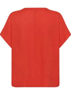 Blouse rouge unie pourvue d'un col tunisien et de manches courtes