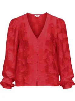 Blouse rouge unie pourvue d'une coupe droite et de manches longues