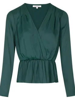 Blouse sapin en satin à coupe péplum col v et à manches longues