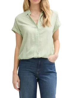 Blouse verte à rayures blanches avec une coupe loose fit et un col v profond