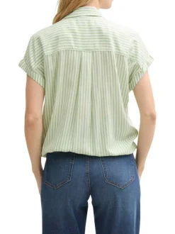 Blouse verte à rayures blanches avec une coupe loose fit et un col v profond