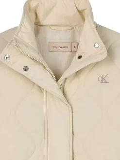 Blouson beige uni à coupe droite, col montant et aspect matelassé