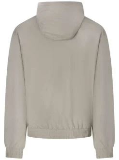 Blouson beige à coupe ajustée pourvu d'un col à capuche avec cordon de serrage
