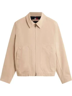 Blouson beige à coupe ajustée pourvu d'un col à revers et de manches longues