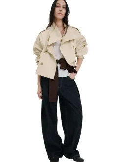 Blouson beige uni avec une coupe cropped et un col montant boutonné