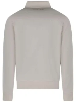 Blouson beige uni avec une coupe droite et un col montant boutonné