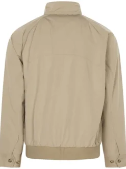 Blouson beige uni avec une coupe droite et un col montant boutonné