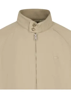 Blouson beige uni avec une coupe droite et un col montant boutonné