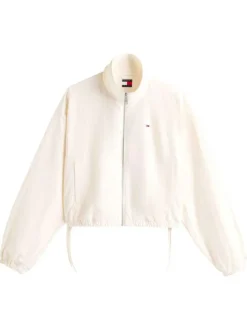 Blouson beige uni avec une coupe droite et un col montant à zip