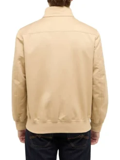 Blouson beige uni avec une coupe droite et un col montant à zip