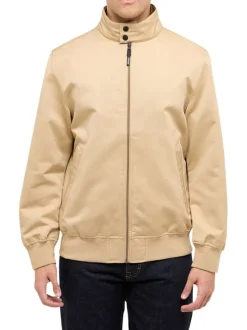 Blouson beige uni avec une coupe droite et un col montant à zip