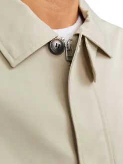Blouson beige uni coupe droite avec un col français et bouton au col