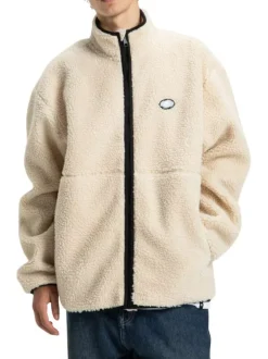 Blouson beige uni en maille effet sherpa et fermeture à glissière