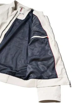 Blouson beige uni pourvu d'une coupe droite et d'un col montant