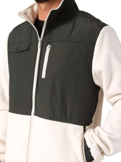 Blouson bi-matière écru et anthracite pourvu de poches plaquées