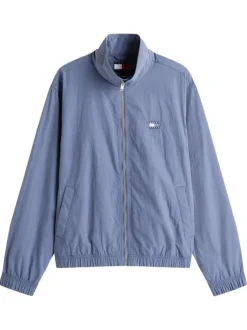 Blouson bleu uni avec une coupe droite col et une fermeture zippée