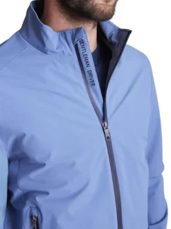 Blouson bleu uni à col montant avec des poches latérales zippées