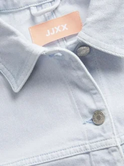 Blouson ciel en coton uni à col chemise et manches longues avec boutons argentés
