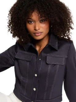 Blouson court indigo uni avec une coupe droite et un col à revers