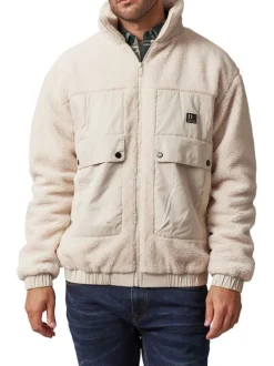 Blouson écru bi-matière à coupe oversize et avec un col montant