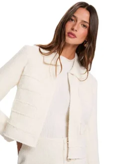 Blouson écru uni avec une coupe droite et des manches longues
