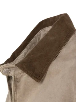 Blouson en coton beige à coupe droite pourvu d'un col à revers en velours