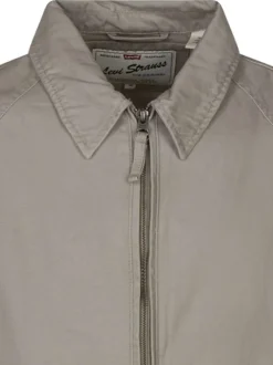 Blouson en coton beige uni avec une coupe droite et un col à revers