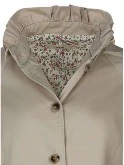 Blouson en coton beige uni pourvu d'une coupe droite et des manches longues