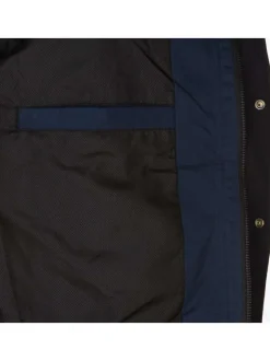 Blouson en coton bleu uni avec une coupe droite et un col montant