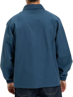 Blouson en coton indigo avec un col chemise et fermeture à glissière