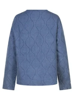 Blouson en coton indigo matelassé à coupe droite avec un col rond