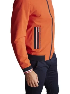 Blouson en coton orange uni à détails bleus marine et avec une coupe slim