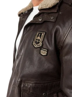 Blouson en cuir de mouton brun uni avec une coupe droite et un col à revers