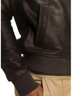 Blouson en cuir de mouton marron uni avec une coupe droite et un col montant