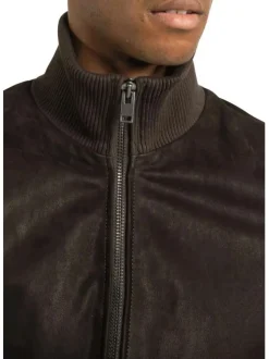 Blouson en cuir de mouton marron uni avec une coupe droite et un col montant