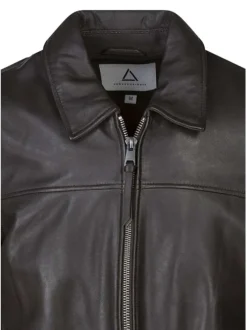 Blouson en cuir de mouton marron uni avec une coupe droite et un col à revers