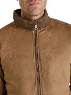 Blouson en cuir taupe uni avec une coupe droite et un col montant