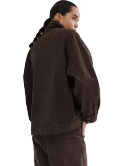 Blouson en lin marron uni pourvu d'une coupe oversize et d'un col montant