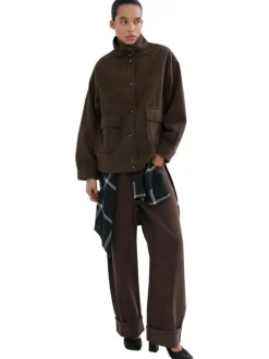 Blouson en lin marron uni pourvu d'une coupe oversize et d'un col montant