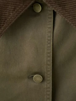 Blouson kaki uni avec une coupe droite et un col à revers en velours