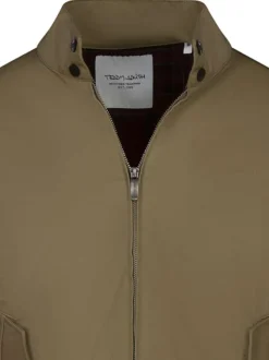 Blouson manches longues beige uni avec une coupe droite et un col montant